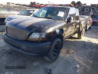 1999 Ford F-150 XL with VIN 1FTRX07L3XKC15874, listed as a IAAI auction lot 41363405 with Not Provided miles. Bid and sale history available at carsss.com. Image 2.