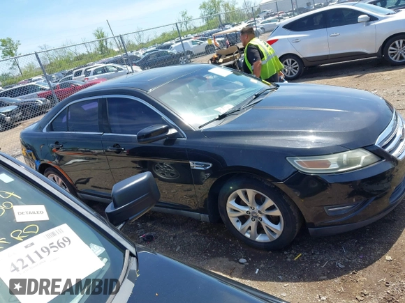 2011 Ford Taurus SEL with VIN 1FAHP2EW6BG127102, listed as a IAAI auction lot 42131123 with 168,965 mi miles. Bid and sale history available at carsss.com. Image 13.