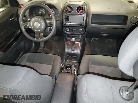 2014 Jeep Patriot Sport with VIN 1C4NJPBA3ED925535, listed as a Copart auction lot 61402245 with 98,582 mi miles and Salvage title. Bid and sale history available at DreamBid. Image 8.