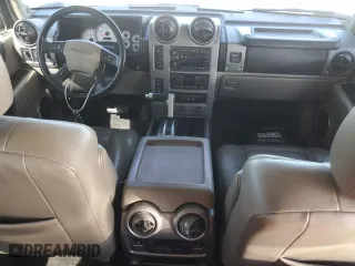 2003 Hummer H2 with VIN 5GRGN23U33H114427, listed as a Copart auction lot 76528834 with 133,571 mi miles and Salvage Title. Bid and sale history available at carsss.com. Image 8.