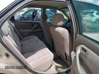 1997 Toyota Camry LE z VIN 4T1BG22K7VU818805, wystawiony jako IAAI lot #42105925 z przebiegiem 140 960 mil mil oraz . Historia ofert i sprzedaży dostępna na DreamBid. Obrazek 8.