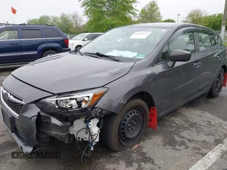 2019 Subaru Impreza with VIN 4S3GTAA69K1711062, listed as a IAAI auction lot 42187136 with 91,423 mi miles and . Bid and sale history available at DreamBid. Image 6.