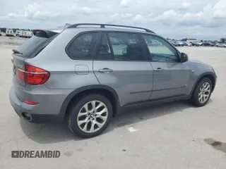2012 BMW X5 35i with VIN 5UXZV4C59CL991689, listed as a Copart auction lot 64022615 with 208,620 mi miles and Salvage title. Bid and sale history available at DreamBid. Image 3.