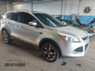 2015 Ford Escape Titanium with VIN 1FMCU9J96FUB23902, listed as a IAAI auction lot 42497188 with 164,452 mi miles and . Bid and sale history available at DreamBid. Image 1.