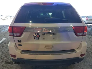2013 Jeep Grand Cherokee Overland with VIN 1C4RJECG3DC620999, listed as a Copart auction lot 88298985 with 182,219 mi miles and Salvage Title. Bid and sale history available at carsss.com. Image 6.