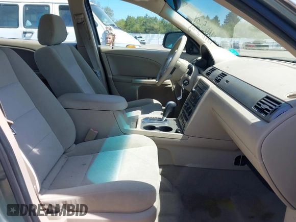 2005 Ford Five Hundred SE z VIN 1FAFP23185G168799, wystawiony jako IAAI lot #42202907 z przebiegiem Nie podano mil oraz . Historia ofert i sprzedaży dostępna na DreamBid. Obrazek 5.