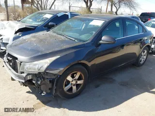 2014 Chevrolet Cruze 1LT with VIN 1G1PC5SB6E7134651, listed as a IAAI auction lot 41764403 with 177,122 mi miles. Bid and sale history available at carsss.com. Image 2.