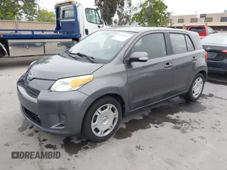 2010 Scion xD with VIN JTKKU4B44A1003993, listed as a IAAI auction lot 42120495 with 71,118 mi miles. Bid and sale history available at carsss.com. Image 2.