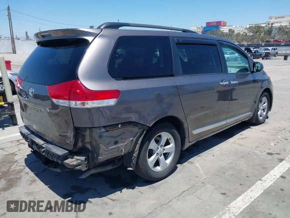 2011 Toyota Sienna LE AAS with VIN 5TDKK3DC3BS049461, listed as a IAAI auction lot 42629071 with 122,023 mi miles and . Bid and sale history available at DreamBid. Image 4.