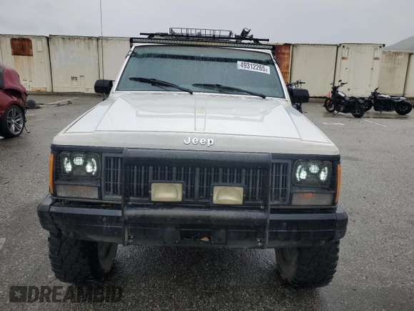 1989 Jeep Cherokee z VIN 1J4FT28LXKL601505, wystawiony jako Copart lot #49312265 z przebiegiem 264 769 mil mil oraz Szkoda całkowita • Salvage title. Historia ofert i sprzedaży dostępna na DreamBid. Obrazek 5.