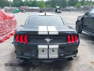 2021 Ford Mustang EcoBoost z VIN 1FA6P8TH4M5117245, wystawiony jako IAAI lot #39793267 z przebiegiem 15 913 mil mil oraz . Historia ofert i sprzedaży dostępna na DreamBid. Obrazek 16.