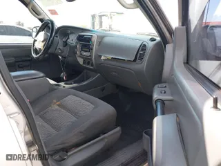 2004 Ford Explorer Sport Trac XLS with VIN 1FMZU77K84UC04230, listed as a IAAI auction lot 41909068 with 237,662 mi miles. Bid and sale history available at carsss.com. Image 5.