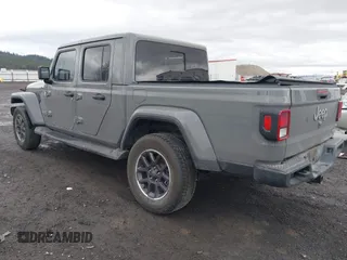 2022 Jeep Gladiator High Altitude with VIN 1C6HJTFG4NL131029, listed as a IAAI auction lot 41789060 with 50,347 mi miles and . Bid and sale history available at DreamBid. Image 3.