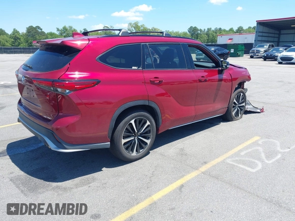 2021 Toyota Highlander XSE with VIN 5TDJZRBH0MS129571, listed as a IAAI auction lot 42285003 with 92,920 mi miles and . Bid and sale history available at DreamBid. Image 4.