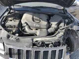2014 Jeep Grand Cherokee Overland with VIN 1C4RJFCG4EC172361, listed as a Copart auction lot 49053155 with 144,916 mi miles and Salvage Title. Bid and sale history available at DreamBid. Image 12.
