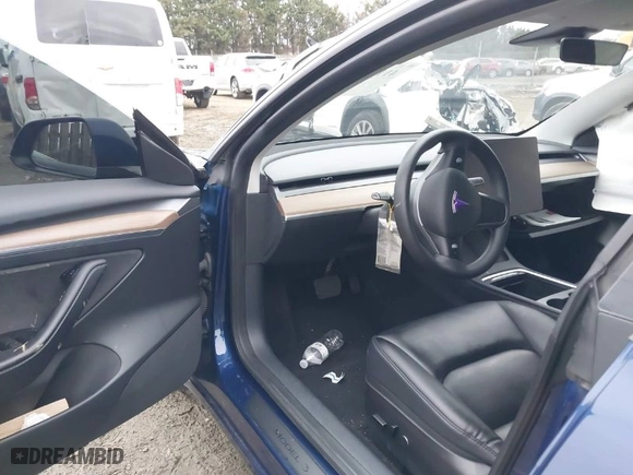 2023 Tesla Model 3 with VIN 5YJ3E1EA7PF446874, listed as a IAAI auction lot 41133303 with 47,748 mi miles. Bid and sale history available at carsss.com. Image 5.