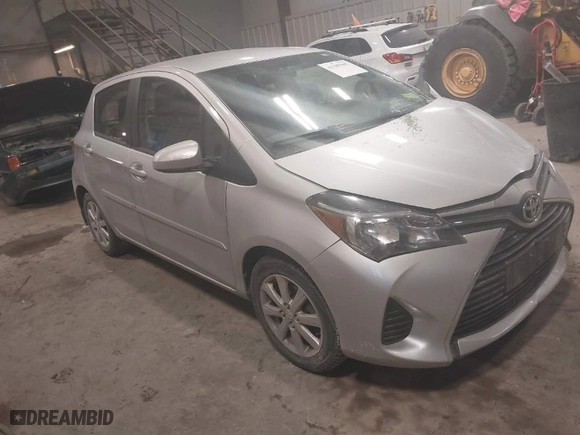 2016 Toyota Yaris L with VIN VNKKTUD32GA066699, listed as a IAAI auction lot 41387987 with 76,595 mi miles. Bid and sale history available at carsss.com. Image 1.