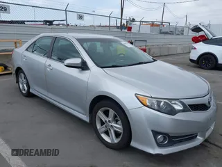 2014 Toyota Camry L with VIN 4T1BF1FK9EU438873, listed as a IAAI auction lot 42083666 with 118,597 mi miles. Bid and sale history available at carsss.com. Image 1.
