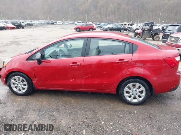 2013 Kia Rio LX with VIN KNADM4A34D6310495, listed as a IAAI auction lot 41986664 with 129,145 mi miles. Bid and sale history available at carsss.com. Image 14.