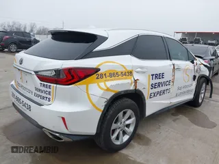 2016 Lexus RX 350 with VIN 2T2BZMCA5GC032156, listed as a IAAI auction lot 41623595 with 133,103 mi miles and . Bid and sale history available at DreamBid. Image 4.