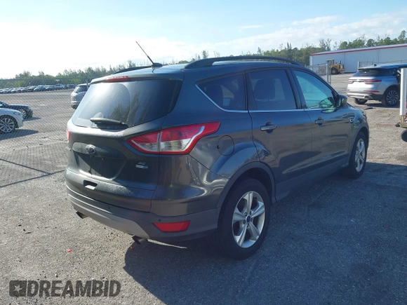 2016 Ford Escape SE with VIN 1FMCU9GX3GUB78749, listed as a IAAI auction lot 42030262 with 93,365 mi miles. Bid and sale history available at carsss.com. Image 4.