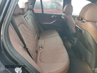 2024 BMW X5 sDrive40i with VIN 5UX13EU04R9T91552, listed as a Copart auction lot 55486545 with 12,995 mi miles and Salvage title. Bid and sale history available at DreamBid. Image 11.