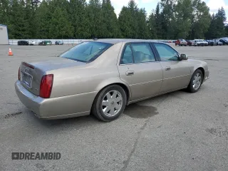 2004 Cadillac DeVille DTS z VIN 1G6KF579X4U212415, wystawiony jako Copart lot #58005555 z przebiegiem 97 663 mil mil oraz Tytuł czysty. Historia ofert i sprzedaży dostępna na DreamBid. Obrazek 3.