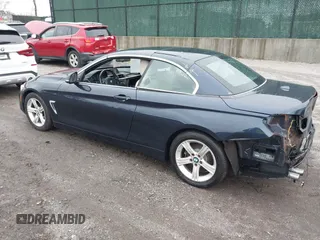 2015 BMW 4 Series 428i with VIN WBA3V7C55FP772912, listed as a IAAI auction lot 41787037 with 76,239 mi miles. Bid and sale history available at carsss.com. Image 3.