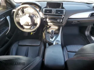 2015 BMW 2 Series 228i with VIN WBA1K5C59FV242992, listed as a Copart auction lot 75433654 with Not provided miles and Salvage title. Bid and sale history available at DreamBid. Image 8.