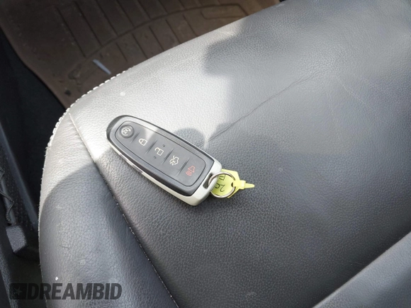 2016 Ford Escape Titanium with VIN 1FMCU9JX3GUA62802, listed as a IAAI auction lot 42001690 with 124,452 mi miles. Bid and sale history available at carsss.com. Image 11.