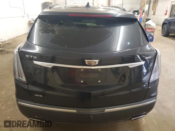 2021 Cadillac XT5 AWD Sport with VIN 1GYKNHRS1MZ103033, listed as a Copart auction lot 58586425 with 65,229 mi miles and Salvage title. Bid and sale history available at DreamBid. Image 6.