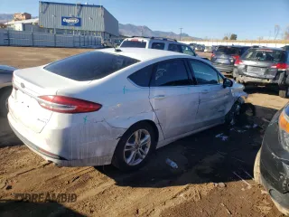 2018 Ford Fusion Hybrid SE with VIN 3FA6P0LU2JR246284, listed as a Copart auction lot 69044562 with 77,446 mi miles. Bid and sale history available at carsss.com. Image 3.