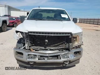 2019 Ford F-150 XL with VIN 1FTEW1E42KKE77610, listed as a IAAI auction lot 41765076 with 155,437 mi miles and . Bid and sale history available at DreamBid. Image 12.