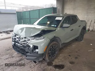 2024 Hyundai Santa Cruz SEL z VIN 5NTJBDDE6RH120060, wystawiony jako IAAI lot #42027494 z przebiegiem 10 075 mil mil oraz . Historia ofert i sprzedaży dostępna na DreamBid. Obrazek 2.
