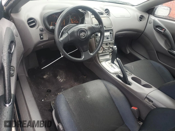 2000 Toyota Celica GT z VIN JTDDR32T1Y0037067, wystawiony jako Copart lot #55262244 z przebiegiem 272 092 mil mil oraz Szkoda całkowita • Salvage title. Historia ofert i sprzedaży dostępna na DreamBid. Obrazek 8.