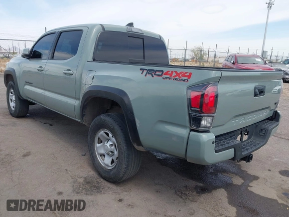 2022 Toyota Tacoma SR with VIN 3TMCZ5AN0NM507320, listed as a IAAI auction lot 42220296 with 33,342 mi miles and . Bid and sale history available at DreamBid. Image 3.