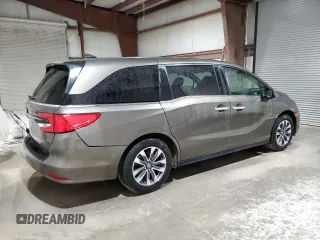 2022 Honda Odyssey EX-L z VIN 5FNRL6H71NB008541, wystawiony jako Copart lot #56850895 z przebiegiem 32 466 mil mil oraz Szkody całkowita. Historia ofert i sprzedaży dostępna na DreamBid. Obrazek 3.
