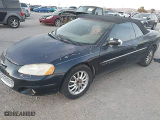 2001 Chrysler Sebring Limited with VIN 1C3EL65U31N672381, listed as a IAAI auction lot 41114181 with 180,949 mi miles. Bid and sale history available at carsss.com. Image 2.