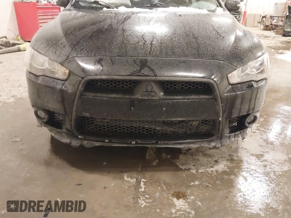 2015 Mitsubishi Lancer SE with VIN JA32V2FW6FU019508, listed as a IAAI auction lot 41633196 with 91,758 mi miles. Bid and sale history available at carsss.com. Image 6.