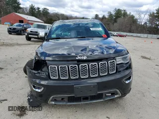 2021 Jeep Grand Cherokee Overland with VIN 1C4RJFCG6MC582917, listed as a Copart auction lot 50389315 with 55,000 mi miles and Salvage title. Bid and sale history available at DreamBid. Image 5.
