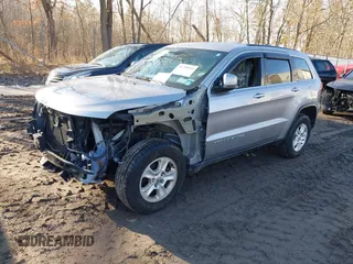 2015 Jeep Grand Cherokee Laredo with VIN 1C4RJFAG9FC775004, listed as a IAAI auction lot 41754534 with 116,893 mi miles. Bid and sale history available at carsss.com. Image 17.