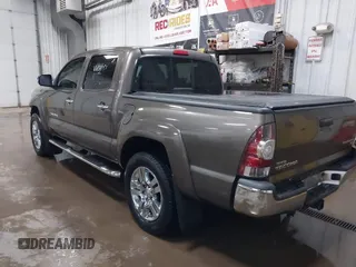 2014 Toyota Tacoma PreRunner with VIN 3TMJU4GNXEM164507, listed as a IAAI auction lot 42118984 with 183,101 mi miles and . Bid and sale history available at DreamBid. Image 3.