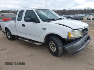 2003 Ford F-150 XL with VIN 1FTRX17W23NA71890, listed as a IAAI auction lot 41716266 with 1 mi miles. Bid and sale history available at carsss.com. Image 1.