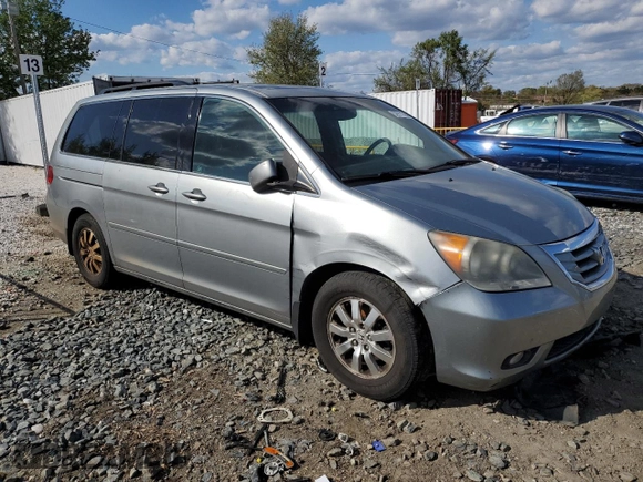 2010 Honda Odyssey EX-L with VIN 5FNRL3H78AB030903, listed as a Copart auction lot 52911705 with 200,499 mi miles and Salvage Title. Bid and sale history available at carsss.com. Image 4.