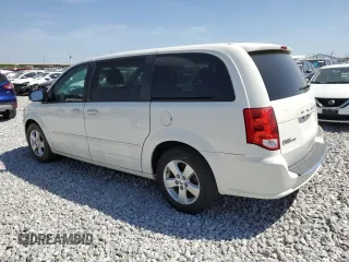 2013 Dodge Grand Caravan SE with VIN 2C4RDGBG9DR772944, listed as a Copart auction lot 56014894 with 193,635 mi miles and Salvage Title. Bid and sale history available at DreamBid. Image 2.