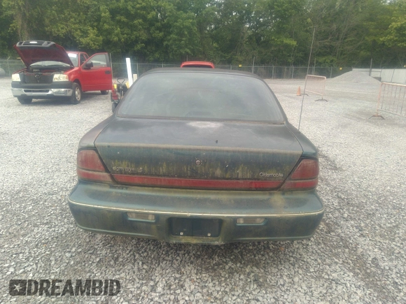 1998 Oldsmobile 88 LS z VIN 1G3HN52K5W4849011, wystawiony jako IAAI lot #42153650 z przebiegiem 171 969 mil mil oraz . Historia ofert i sprzedaży dostępna na DreamBid. Obrazek 16.