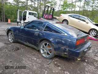 1989 Nissan 300ZX z VIN JN1HZ14S7KX290051, wystawiony jako IAAI lot #42203078 z przebiegiem 136 643 mil mil oraz . Historia ofert i sprzedaży dostępna na DreamBid. Obrazek 3.