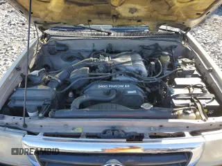 1999 Toyota Tacoma z VIN 4TAWN72N5XZ418522, wystawiony jako Copart lot #51940615 z przebiegiem 340 432 mil mil oraz Szkoda całkowita • Salvage title. Historia ofert i sprzedaży dostępna na DreamBid. Obrazek 11.