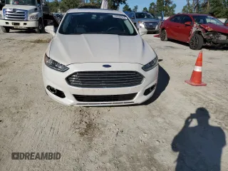 2013 Ford Fusion Titanium Hybrid with VIN 3FA6P0RU2DR277773, listed as a Copart auction lot 85990424 with 215,289 mi miles and Non Repairable. Bid and sale history available at DreamBid. Image 5.
