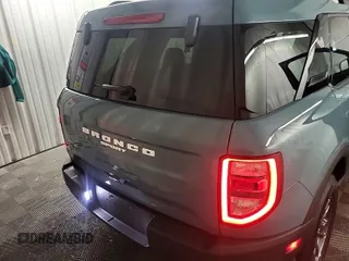 2023 Ford Bronco Sport Big Bend z VIN 3FMCR9B69PRD75724, wystawiony jako IAAI lot #42547276 z przebiegiem 27 623 mil mil oraz . Historia ofert i sprzedaży dostępna na DreamBid. Obrazek 10.
